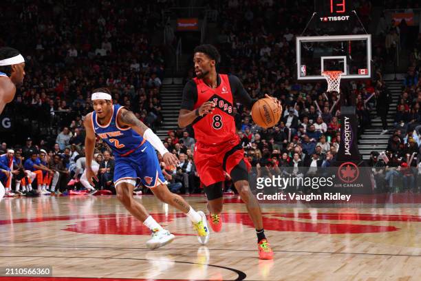 Kobi Simmons of the Toronto Raptors dribbles the ball during the game against the New York Knicks on March 27, 2024 at the Scotiabank Arena in...