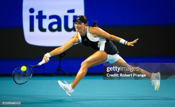 Jessica Pegula of the United States in action against Ekaterina Alexandrova in the quarter-final on Day 12 of the Miami Open Presented by Itau at...