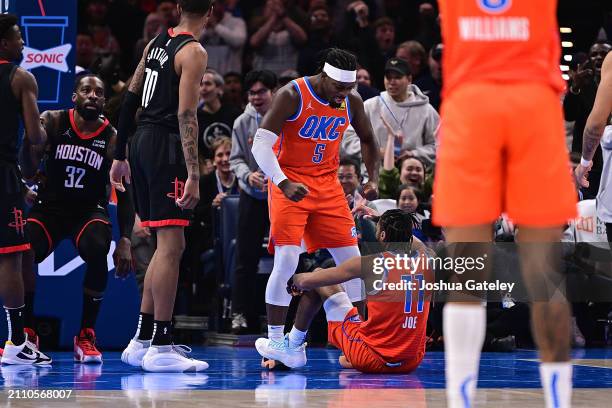 Luguentz Dort and Isaiah Joe of the Oklahoma City Thunder celebrate after a play during the first half against the Houston Rockets at Paycom Center...