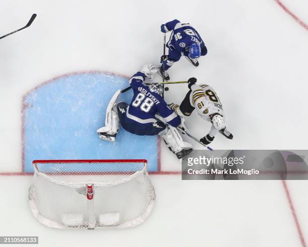 Goalie Andrei Vasilevskiy of the Tampa Bay Lightning stretches to make a save against Pavel Zacha of the Boston Bruins during the second period at...