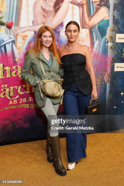 Palina Rojinski and Peri Baumeister attend the "Chantal Im Maerchenland" Premiere at Zoo Palast on March 27, 2024 in Berlin, Germany.