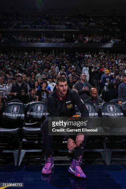 Nikola Jokic of the Denver Nuggets looks on before the game against the Phoenix Suns on March 27, 2023 at the Ball Arena in Denver, Colorado. NOTE TO...