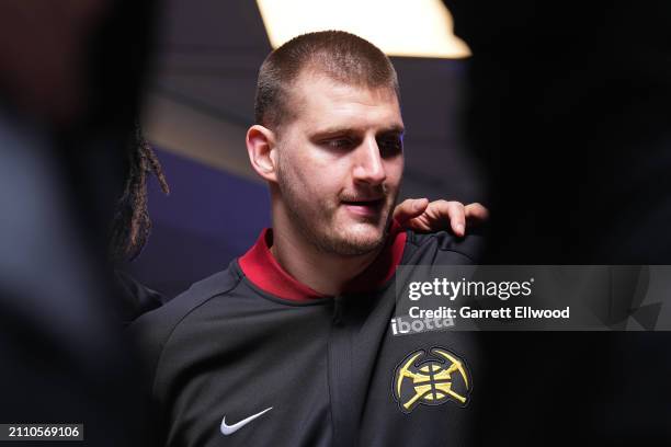 Nikola Jokic of the Denver Nuggets looks on before the game against the Phoenix Suns on March 27, 2023 at the Ball Arena in Denver, Colorado. NOTE TO...