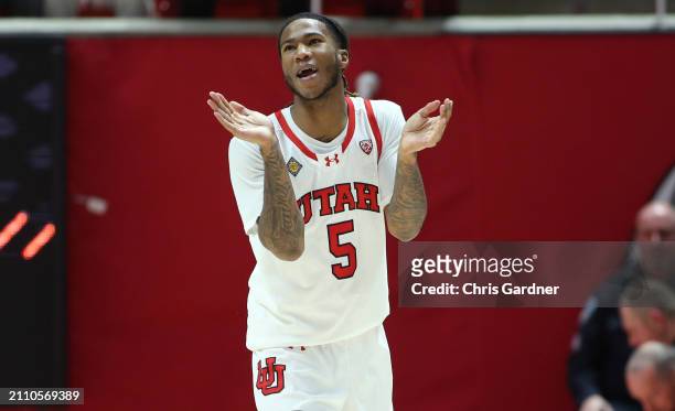 Deivon Smith of the Utah Utes celebrates during the second half of their game agaisnt the VCU Rams in the quarterfinals of the NIT Mens Basketball...