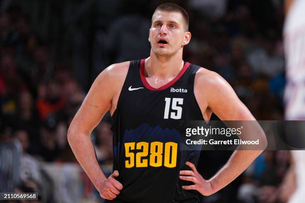 Nikola Jokic of the Denver Nuggets looks on during the game against the Phoenix Suns on March 27, 2023 at the Ball Arena in Denver, Colorado. NOTE TO...