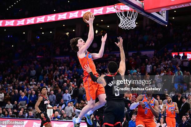 Josh Giddey of the Oklahoma City Thunder goes up for a shot at the rim during the second half against the Houston Rockets at Paycom Center on March...