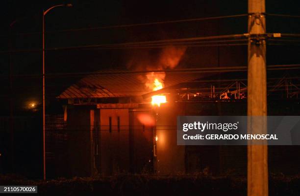 Fire is seen at the Guayas 4 block inside the Regional 8 prison complex after an "internal revolt" by inmates, in Guayaquil, Ecuador, on March 27,...