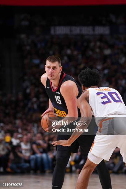 Nikola Jokic of the Denver Nuggets handles the ball during the game on March 27, 2024 at the Ball Arena in Denver, Colorado. NOTE TO USER: User...