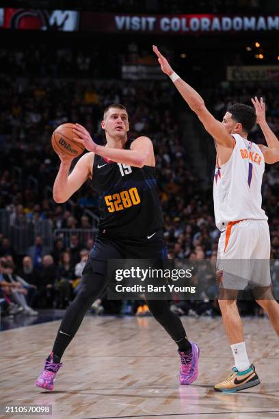 Nikola Jokic of the Denver Nuggets handles the ball during the game on March 27, 2024 at the Ball Arena in Denver, Colorado. NOTE TO USER: User...