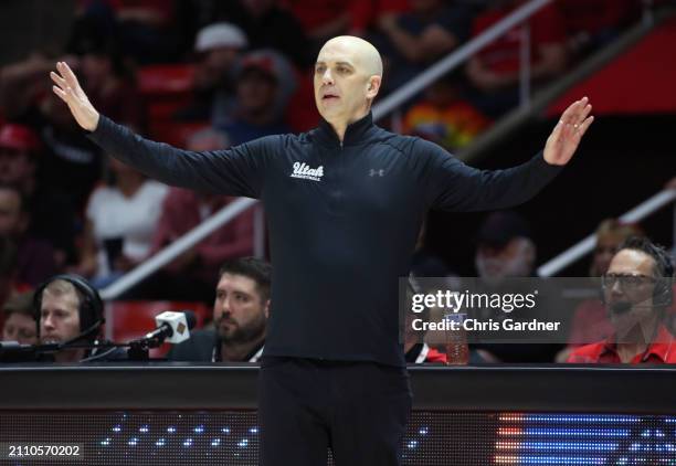 Craig Smith head coach of the Utah Utes slows is team down during the final minutes against the VCU Rams in the quarterfinals of the NIT Mens...