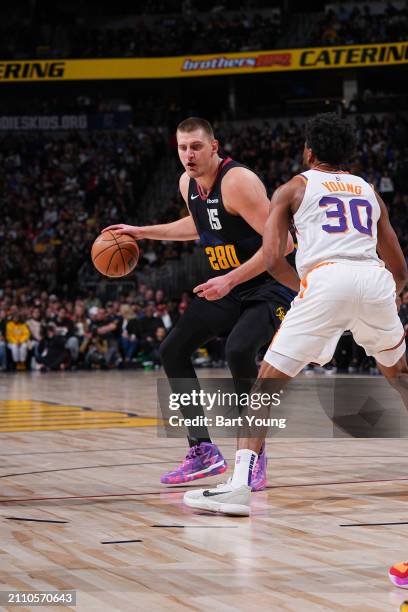 Nikola Jokic of the Denver Nuggets goes to the basket during the game on March 27, 2024 at the Ball Arena in Denver, Colorado. NOTE TO USER: User...