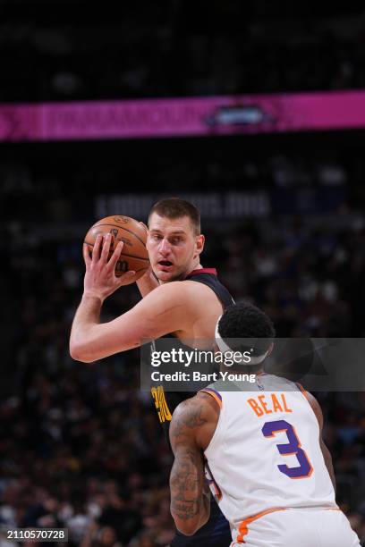 Nikola Jokic of the Denver Nuggets handles the ball during the game on March 27, 2024 at the Ball Arena in Denver, Colorado. NOTE TO USER: User...