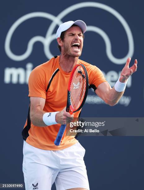 Andy Murray of Great Britain reacts after a lost point against Tomas Machac of the Czech Republic on Day 9 of the Miami Open at Hard Rock Stadium on...