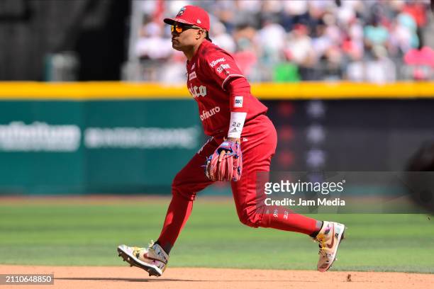 Robinson Cano of Diablos Rojos del Mexico gestures in the second inning during Spring Training Game One between Diablos Rojos and New York Yankees at...
