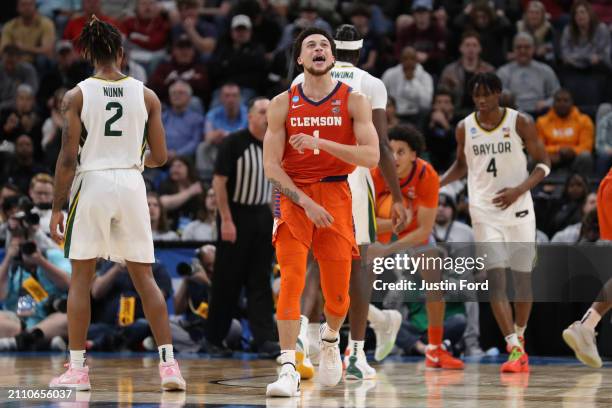 Chase Hunter of the Clemson Tigers celebrates following the victory against the Baylor Bears in the second round of the NCAA Men's Basketball...