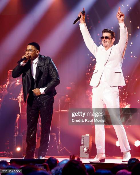 Nelly and Robin Thicke perform on stage during the 25th Annual Mark Twain Prize For American Humor at The Kennedy Center on March 24, 2024 in...