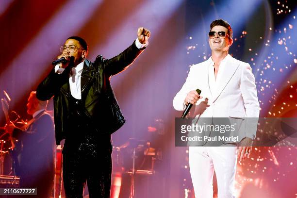 Nelly and Robin Thicke perform on stage during the 25th Annual Mark Twain Prize For American Humor at The Kennedy Center on March 24, 2024 in...