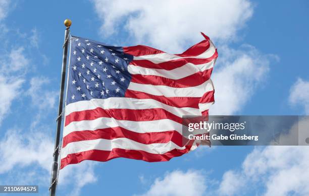 an american flag is seen flying in utah - utah flag stock pictures, royalty-free photos & images