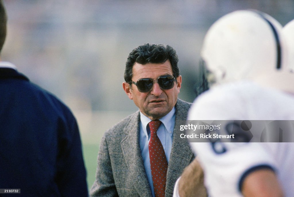 Joe Paterno looks on 