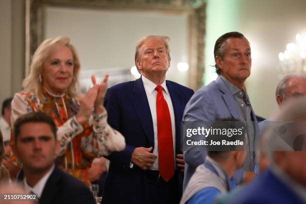 Republican presidential candidate and former President Donald Trump attends a golf awards ceremony held at the Trump International Golf Club on March...