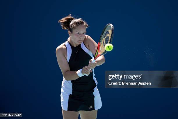 Daria Kasatkina hits a shot against Sorana Cirstea of Romania during their match at Hard Rock Stadium on March 24, 2024 in Miami Gardens, Florida.