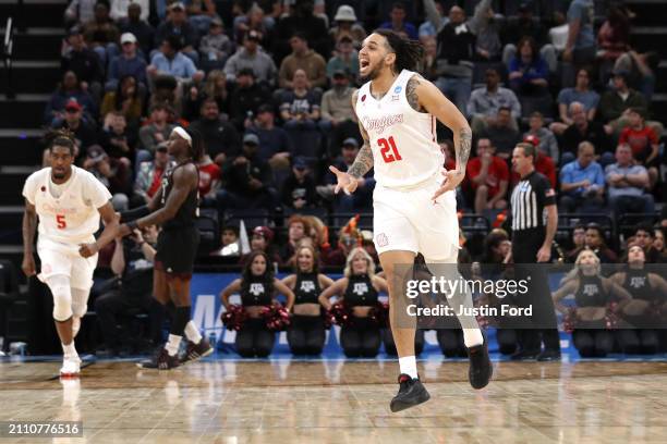 Emanuel Sharp of the Houston Cougars reacts during the first half against the Texas A&M Aggies in the second round of the NCAA Men's Basketball...