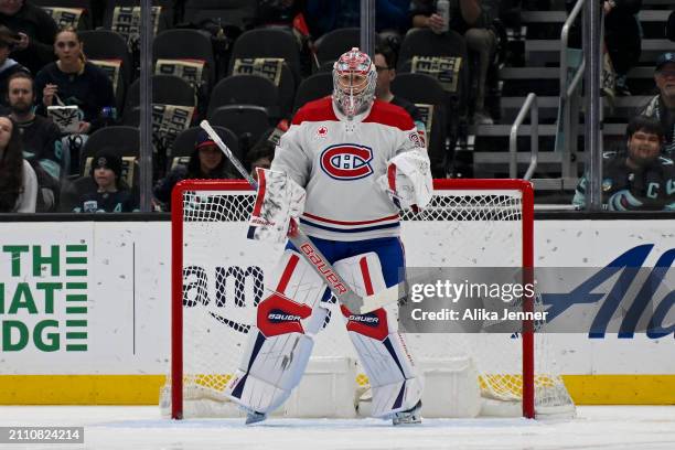 Cayden Primeau of the Montreal Canadiens stands in net during the first period against the Seattle Kraken at Climate Pledge Arena on March 24, 2024...