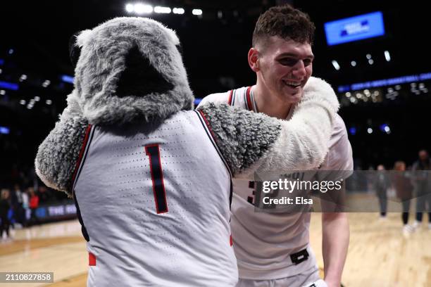 Donovan Clingan of the Connecticut Huskies reacts after a 75-58 victory against the Northwestern Wildcats in the second round of the NCAA Men's...