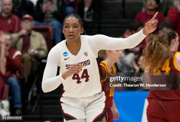 Kiki Iriafen of the Stanford Cardinal reacts after scoring against the Iowa State Cyclones during the first half in the second round of the NCAA...