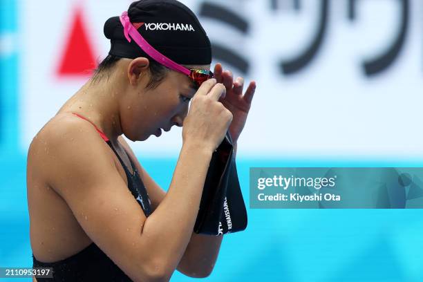 Rikako Ikee reacts after competing in the Women's 50m Freestyle Final during day eight of the Swimming Olympic Qualifier at Tokyo Aquatics Centre on...