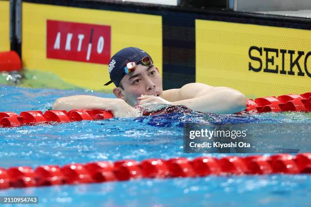 Kenta Ozaki reacts after finishing second in the Men's 1500m Freestyle Final during day eight of the Swimming Olympic Qualifier at Tokyo Aquatics...