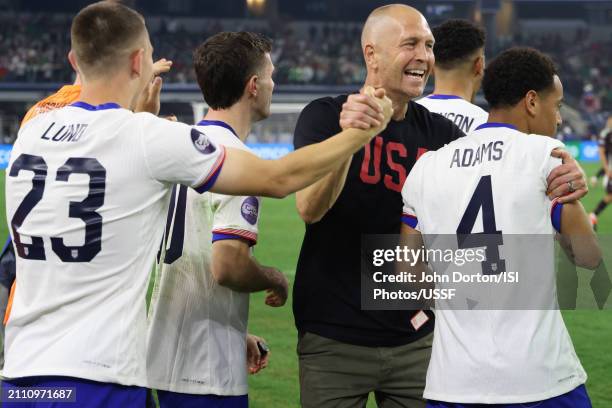 United States head coach Gregg Berhalter celebrates with Tyler Adams and Kristoffer Lund after defeating Mexico in the Concacaf Nations League Final...