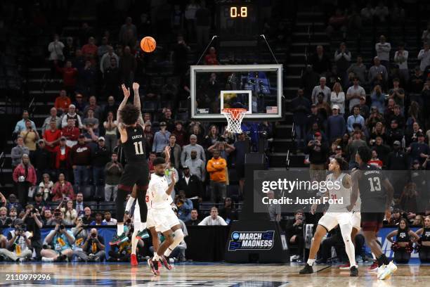 Andersson Garcia of the Texas A&M Aggies makes the game tying shot against the Houston Cougars at the end of regulation in the second round of the...