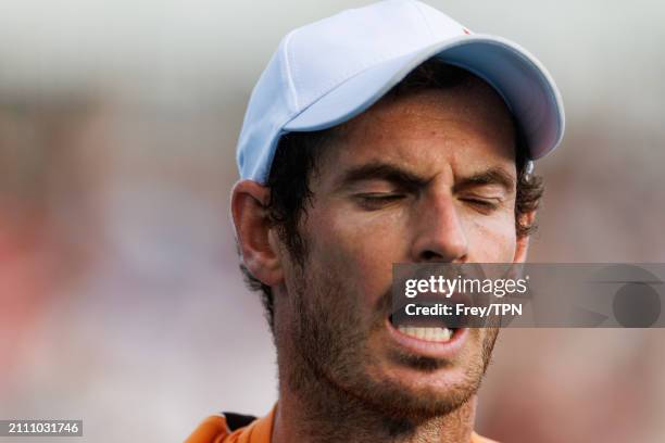 Andy Murray of Great Britain looks dejected during his match against Tomas Machac of the Czech Republic in the third round of the Miami Open at the...