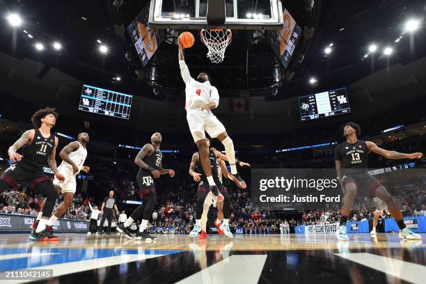 Mylik Wilson of the Houston Cougars shoots the ball against the Texas A&M Aggies in the second round of the NCAA Men's Basketball Tournament at...