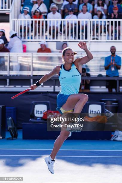 Caroline Garcia of France celebrates her victory over Naomi Osaka of Japan in the third round of the Miami Open at the Hard Rock Stadium on March 24,...