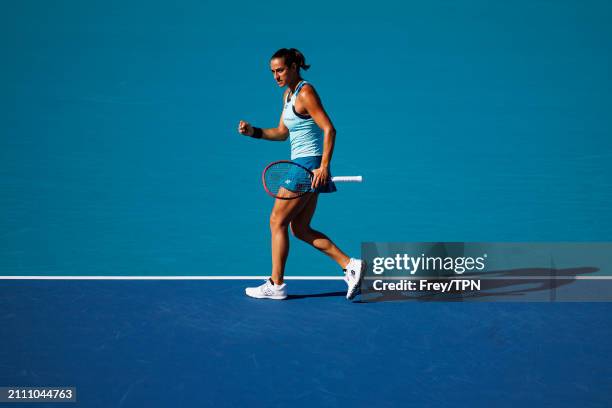 Caroline Garcia of France celebrates against Naomi Osaka of Japan in the third round of the Miami Open at the Hard Rock Stadium on March 24, 2024 in...