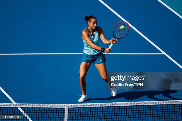 Caroline Garcia of France hits a bachand against Naomi Osaka of Japan in the third round of the Miami Open at the Hard Rock Stadium on March 24, 2024...