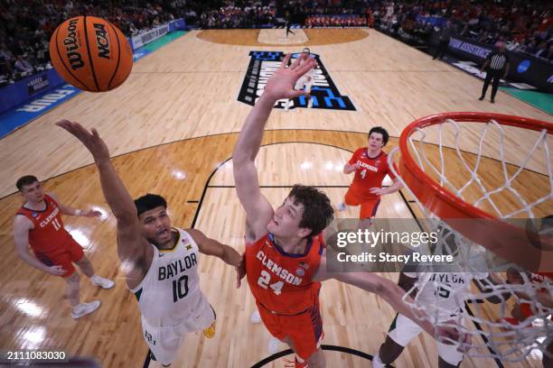 RayJ Dennis of the Baylor Bears shoots the ball against PJ Hall of the Clemson Tigers during the second half in the second round of the NCAA Men's...