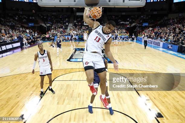 Jaedon LeDee of the San Diego State Aztecs dunks the ball during the second half against the Yale Bulldogs in the second round of the NCAA Men's...