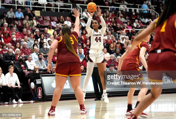 Kiki Iriafen of the Stanford Cardinal shoots over Audi Crooks of the Iowa State Cyclones in overtime in the second round of the NCAA Women's...