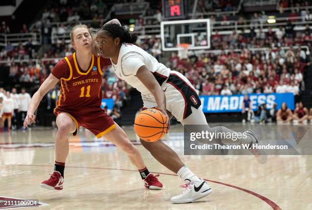 Nunu Agara of the Stanford Cardinal drives to the basket on Emily Ryan of the Iowa State Cyclones during the second half in the second round of the...