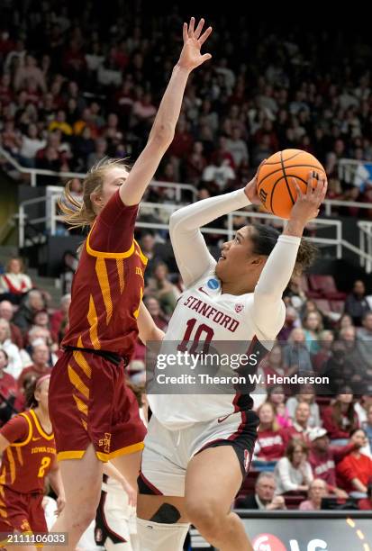 Talana Lepolo of the Stanford Cardinal drives to the basket looking to shoot over Emily Ryan of the Iowa State Cyclones during the second half in the...