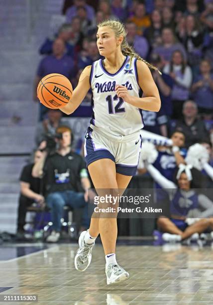 Gabby Gregory of the Kansas State Wildcats dribbles the ball up court against the Colorado Buffaloes in the first half during the second round of the...
