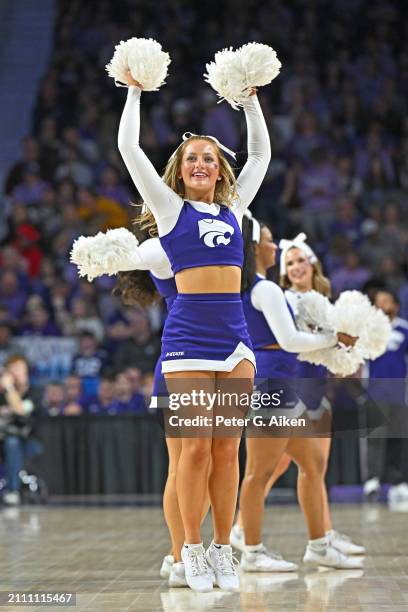 Kansas State Wildcats cheerleader performs during the second round of the NCAA Women's Basketball Tournament at Bramlage Coliseum on March 24, 2024...