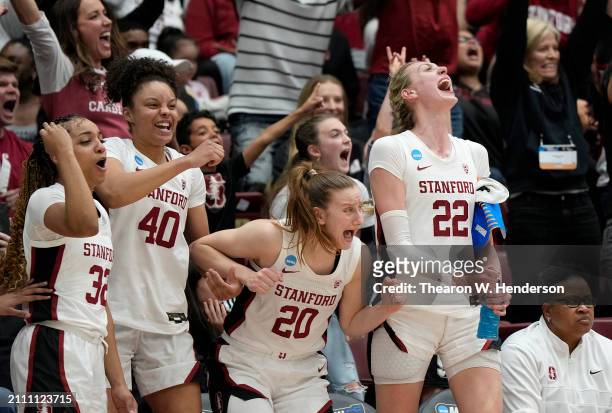 Cameron Brink of the Stanford Cardinal celebrates with teammates on the bench after Brooke Demetre makes a three-point shots against the Iowa State...