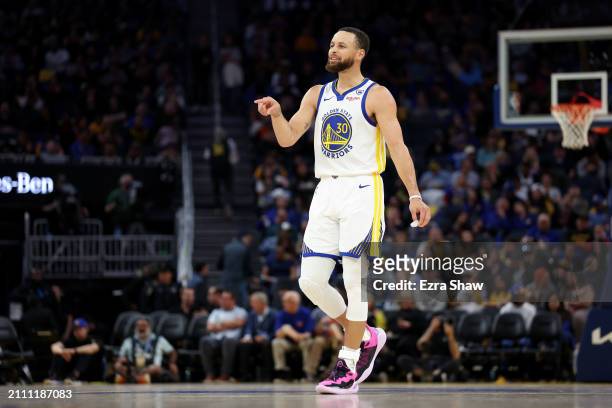 Stephen Curry of the Golden State Warriors stands on the court during their game against the New York Knicks at Chase Center on March 18, 2024 in San...