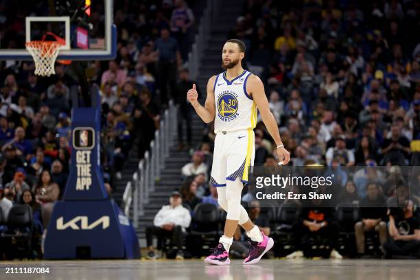 Stephen Curry of the Golden State Warriors stands on the court during their game against the New York Knicks at Chase Center on March 18, 2024 in San...