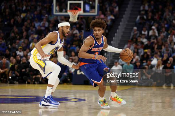Miles McBride of the New York Knicks is guarded by Moses Moody of the Golden State Warriors at Chase Center on March 18, 2024 in San Francisco,...