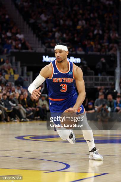 Josh Hart of the New York Knicks dribbles the ball against the Golden State Warriors at Chase Center on March 18, 2024 in San Francisco, California....